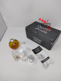 Vue d'ensemble de la lampe catalytique Carma Italia "Amber" dans son emballage