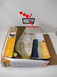 Le lit de voyage Intex Kidz plié et rangé dans son sac de transport.