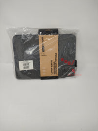 Housse de protection Targus CityLite Pro pour ordinateur portable 13 pouces ou MacBook, de couleur grise et vue sous l'emballage