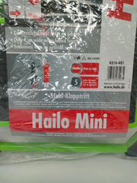 Marchepied HAILO Mini K replié, montrant sa finesse pour le rangement.